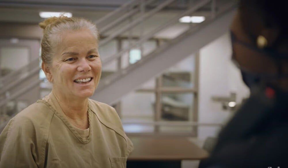 female-inmate-smiling