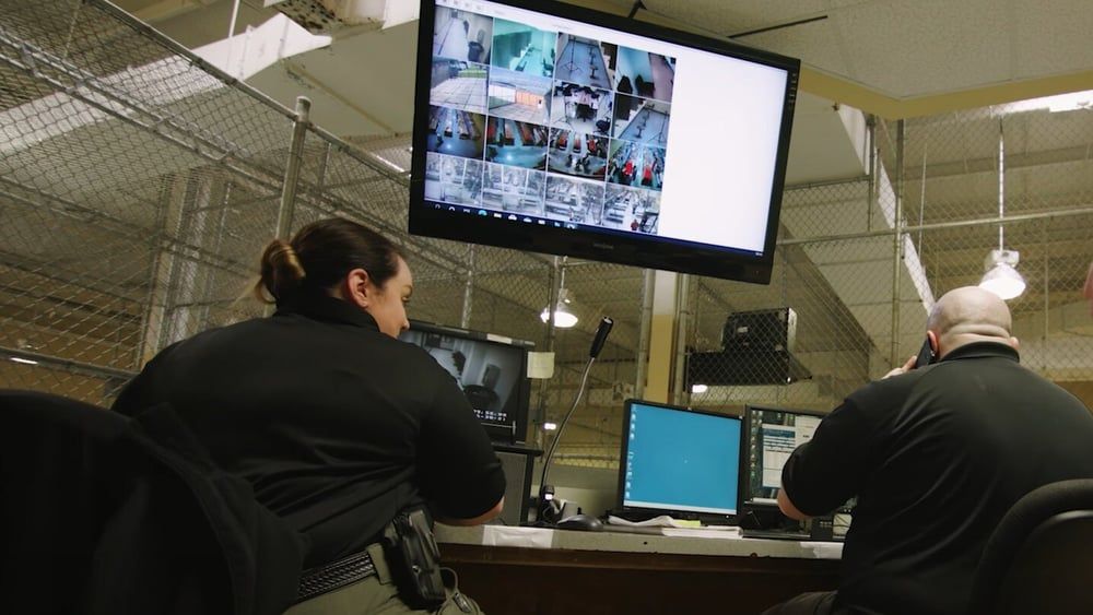 two officers at control center