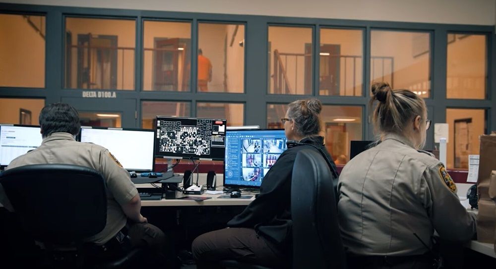 corrections officers at control center