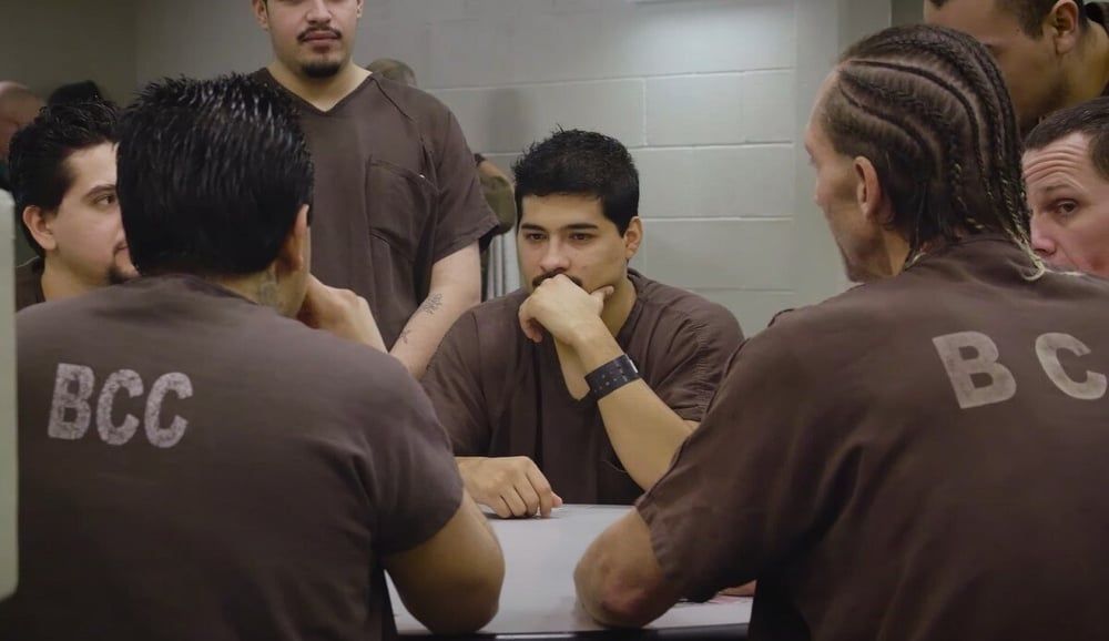 inmates at table