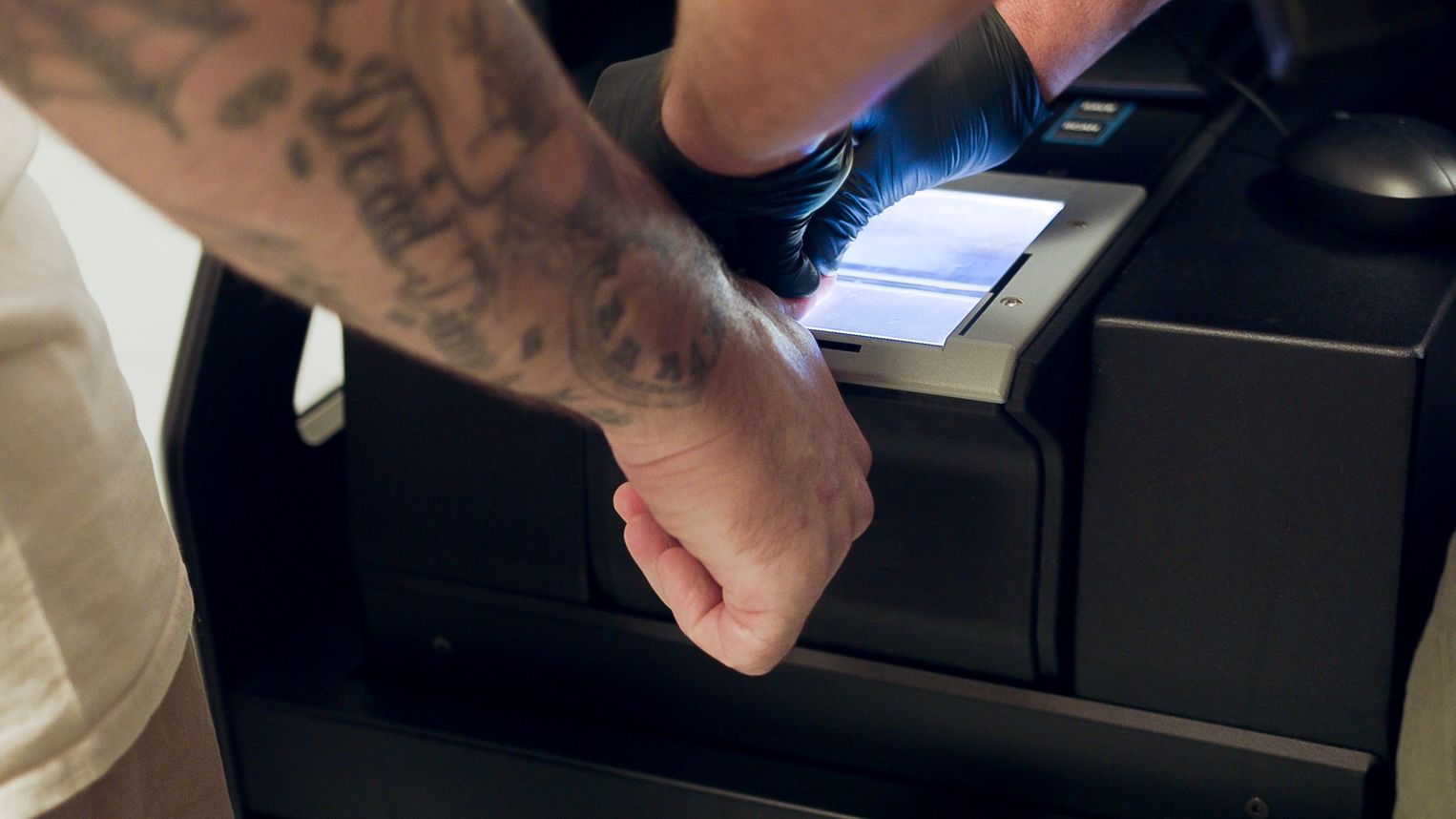 inmate getting fingerprinted