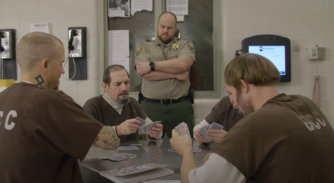 inmates playing cards