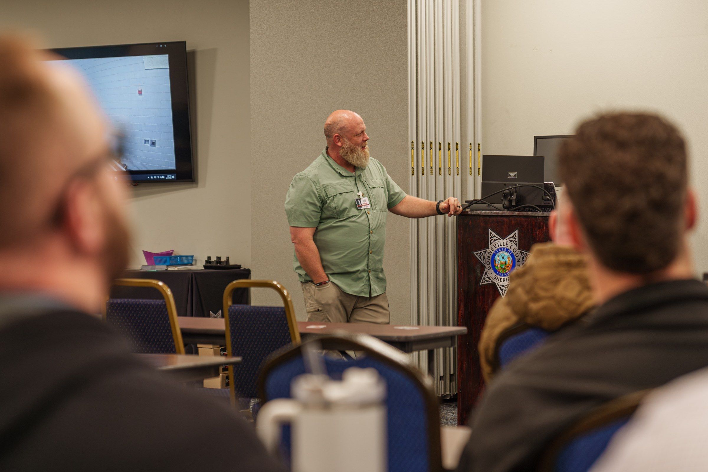 GUARDIAN RFID corrections professional training officers on the platform inside an agency training room
