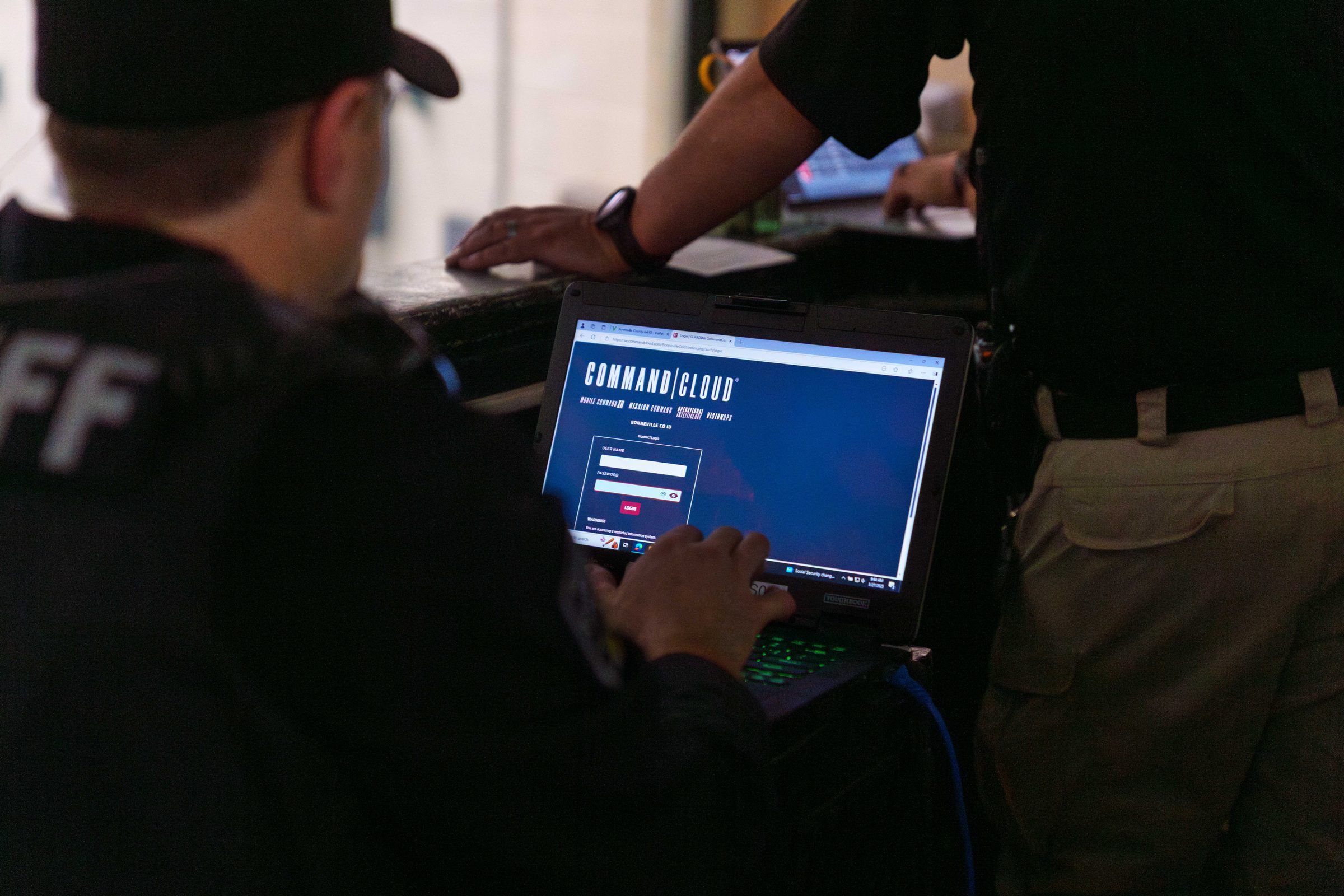 Corrections leader using Command Cloud inmate management software at a workstation