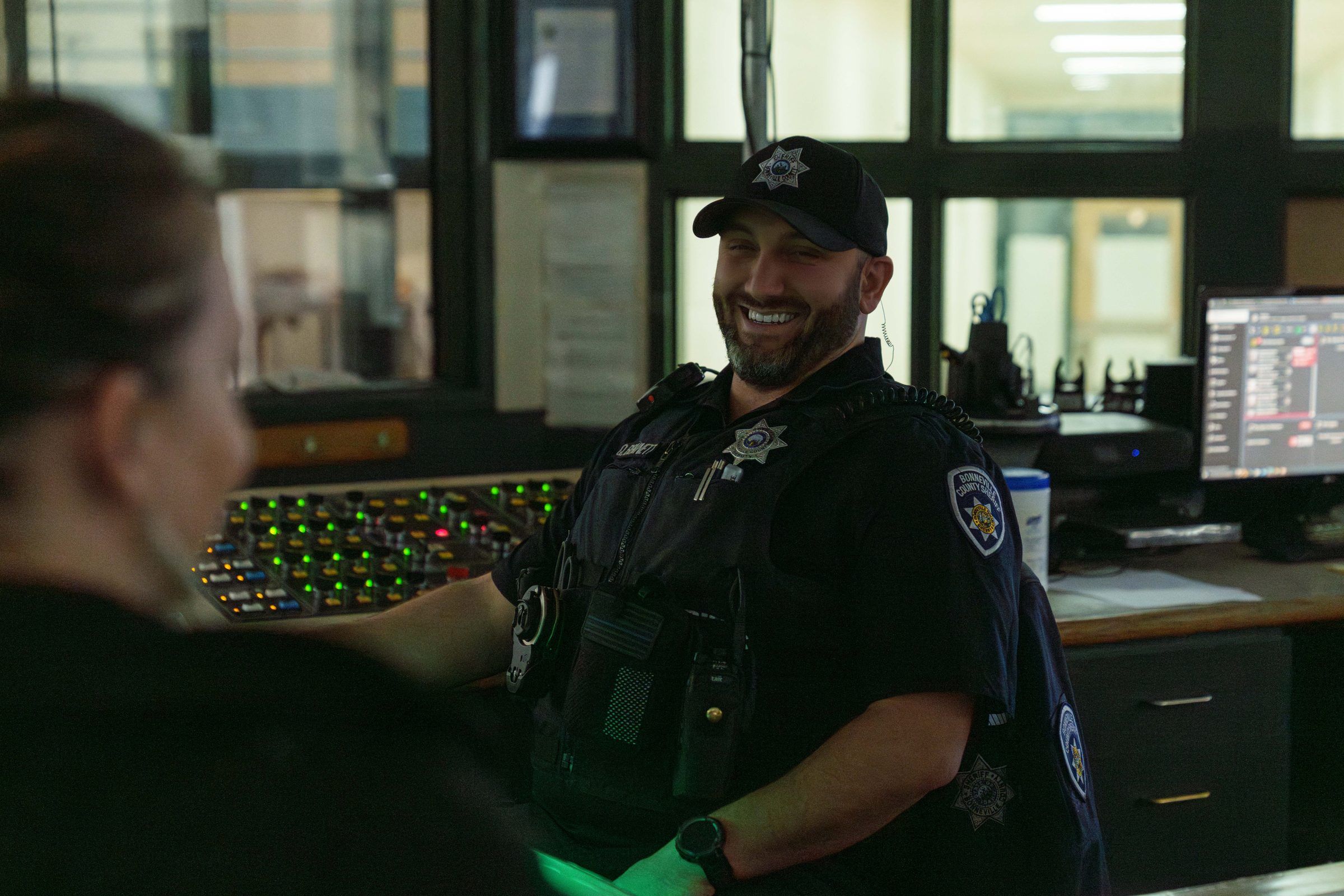 Correctional officer using Command Cloud mobile platform for inmate management
