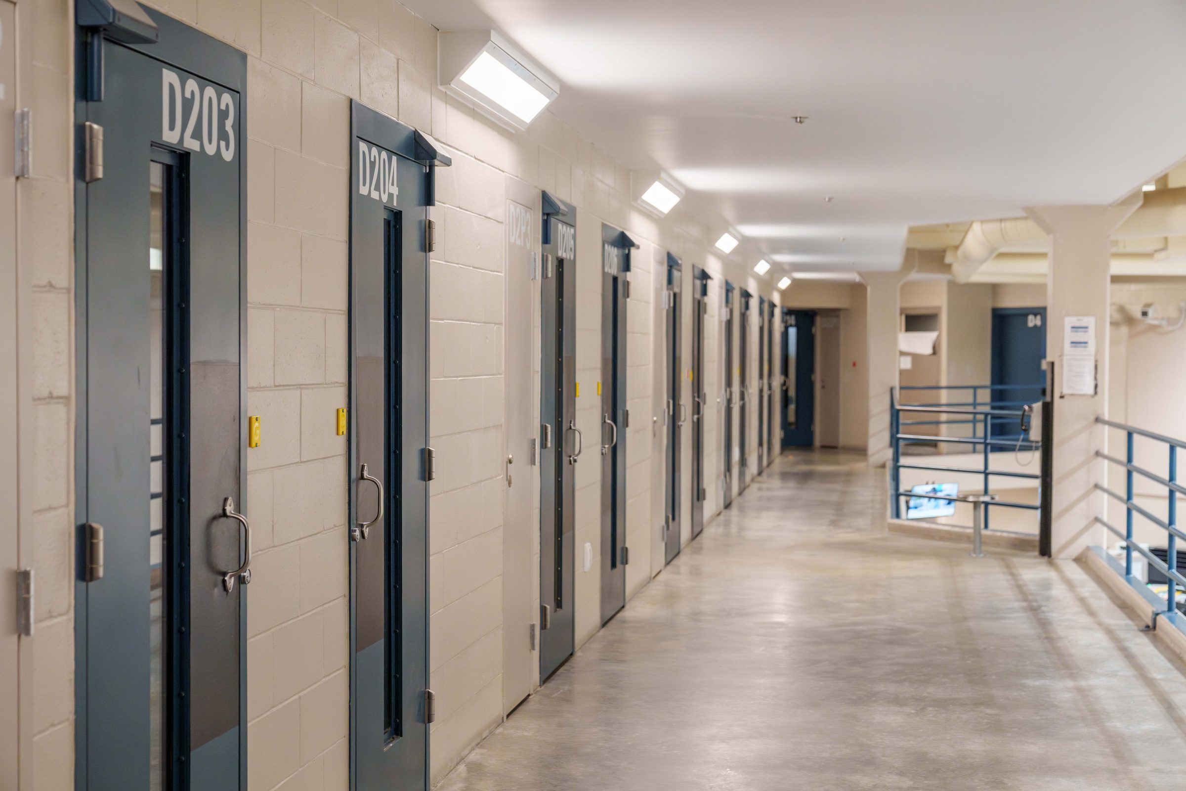 Corridor of cell doors in a jail housing unit