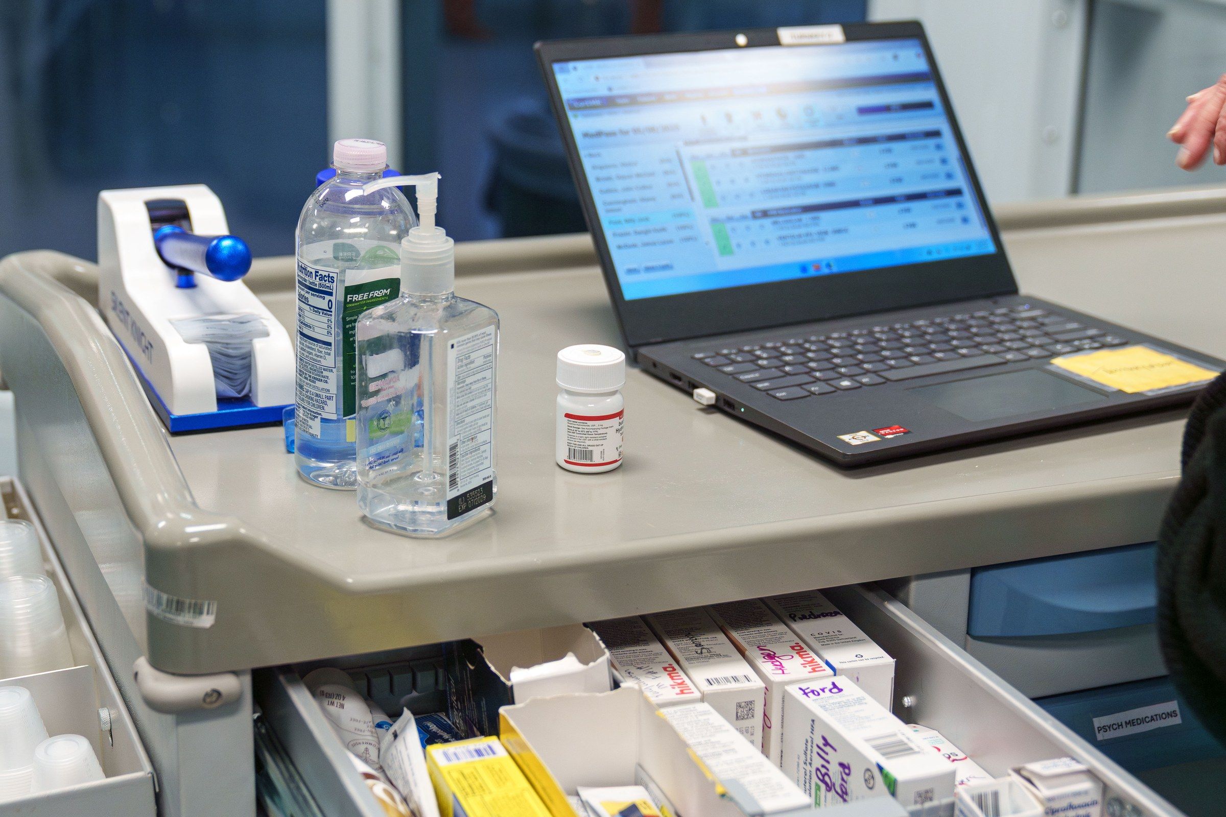 Correctional officers using Medication Manager in a facility