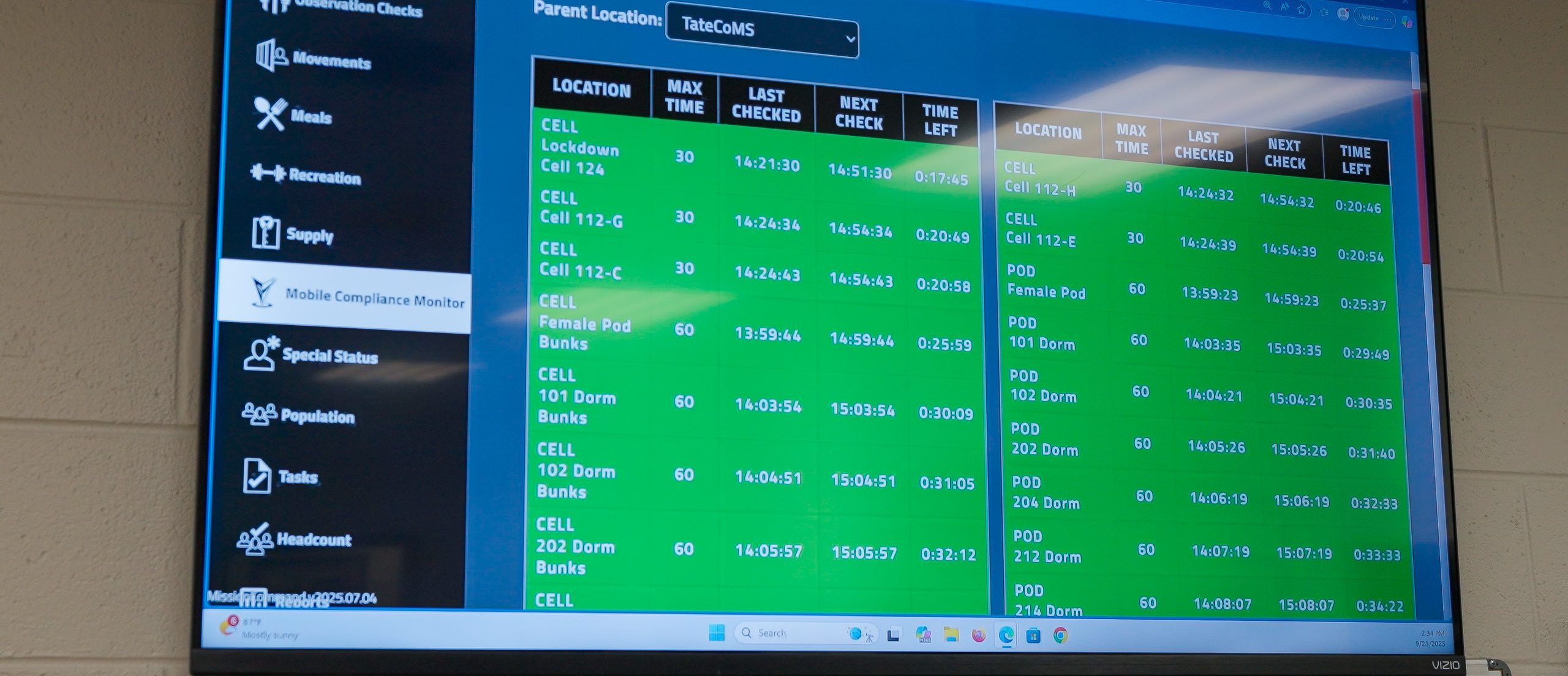 Housing unit wall display running the Mobile Compliance Monitor