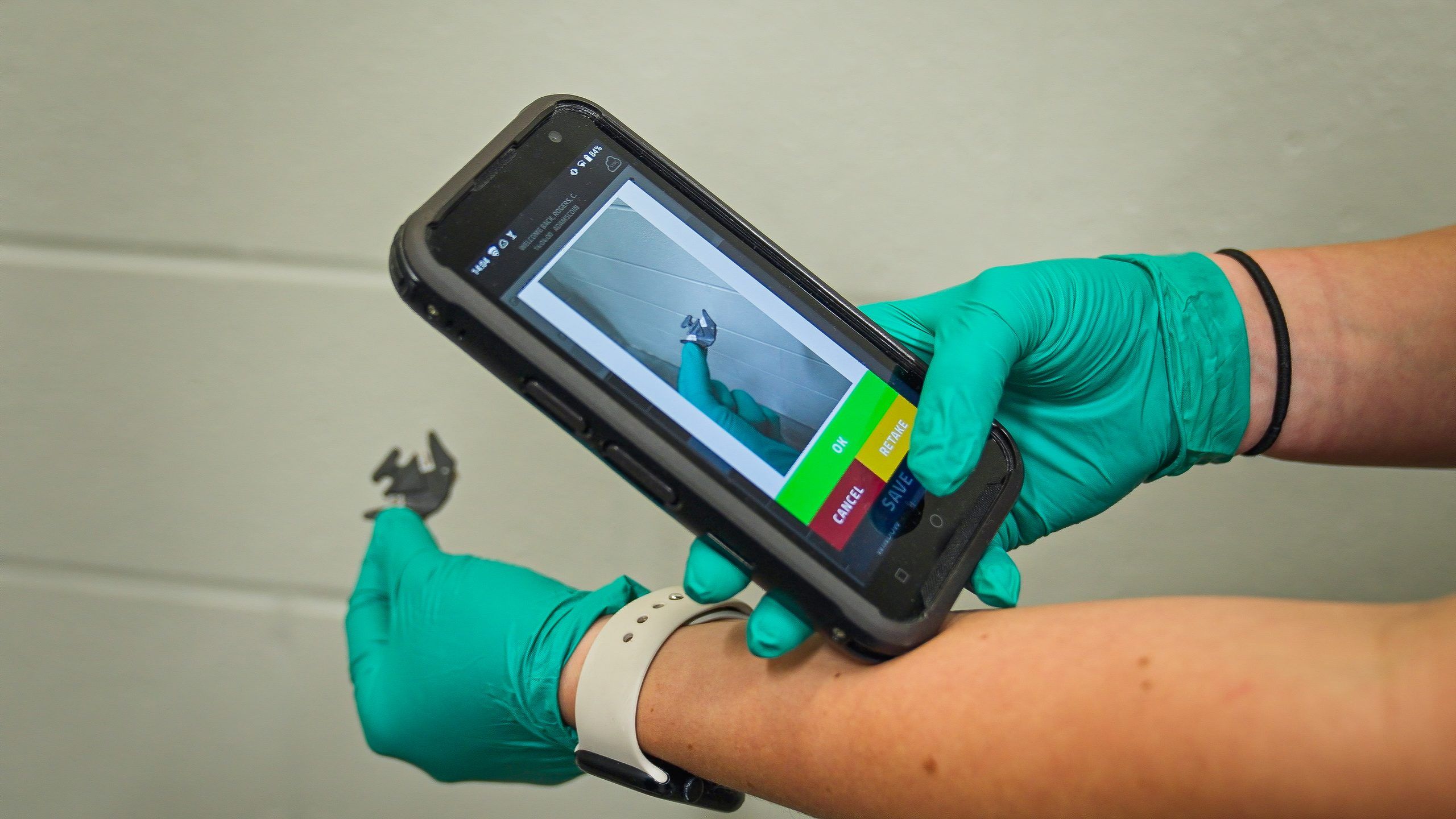 Officer capturing digital evidence with Mobile Command XR