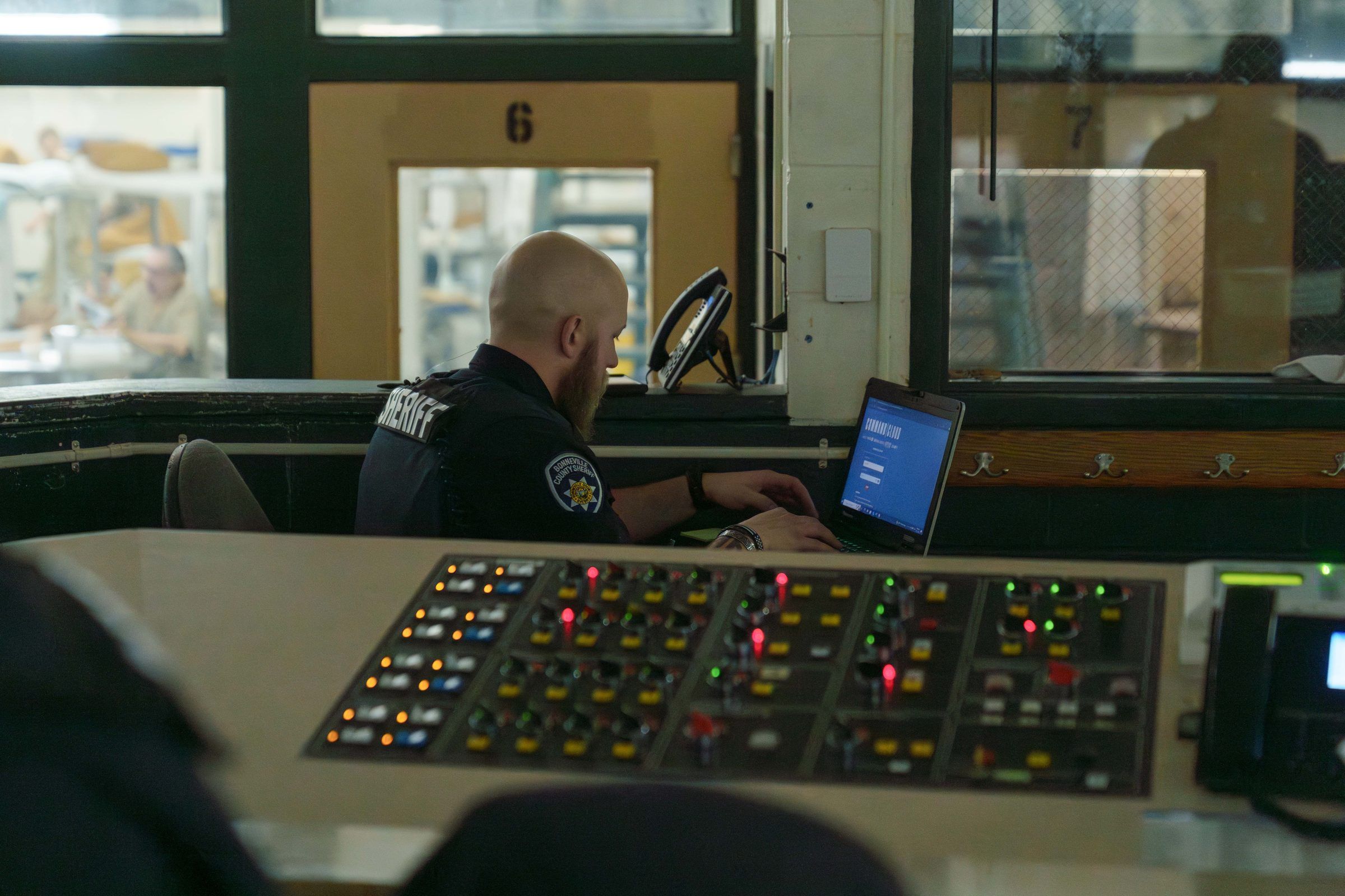 Corrections officer logging into Command Cloud at the jail control panel