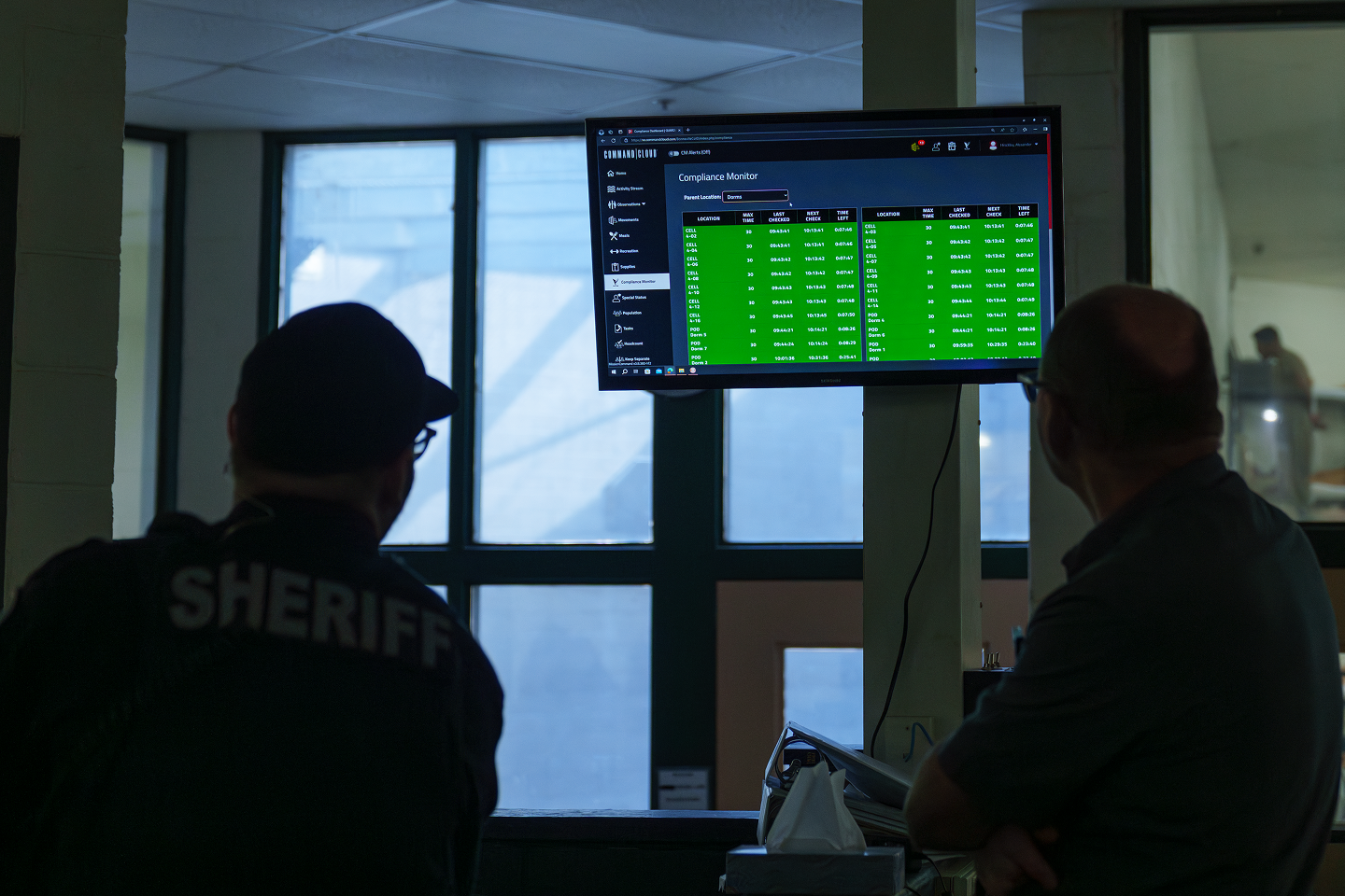 a sheriff looks at Command Cloud in a jail